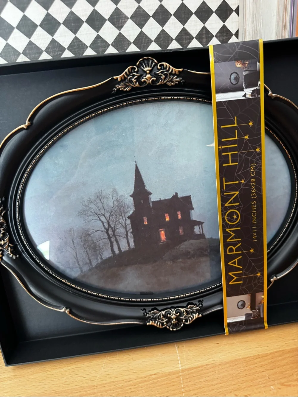 Black Ornate Oval Framed Wall Art - Haunted House Print